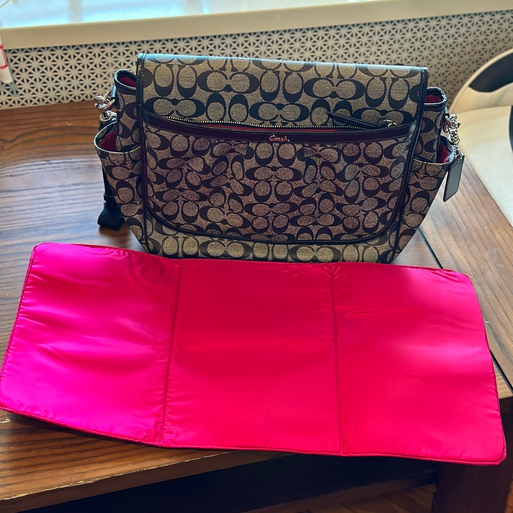 Real Coach Diaper Bag, black and gray with pink trim. Includes pink changing pad